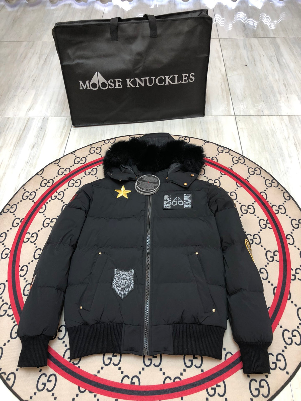 Moose Knuckles Unisex Multi-Patch Hooded Bomber Jacket | Black